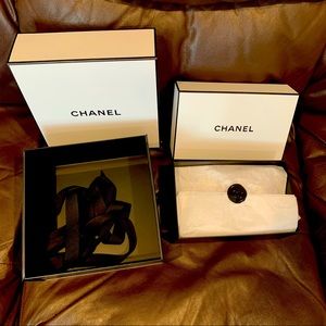 Set 2 of Chanel boxes with ribbon and tissue